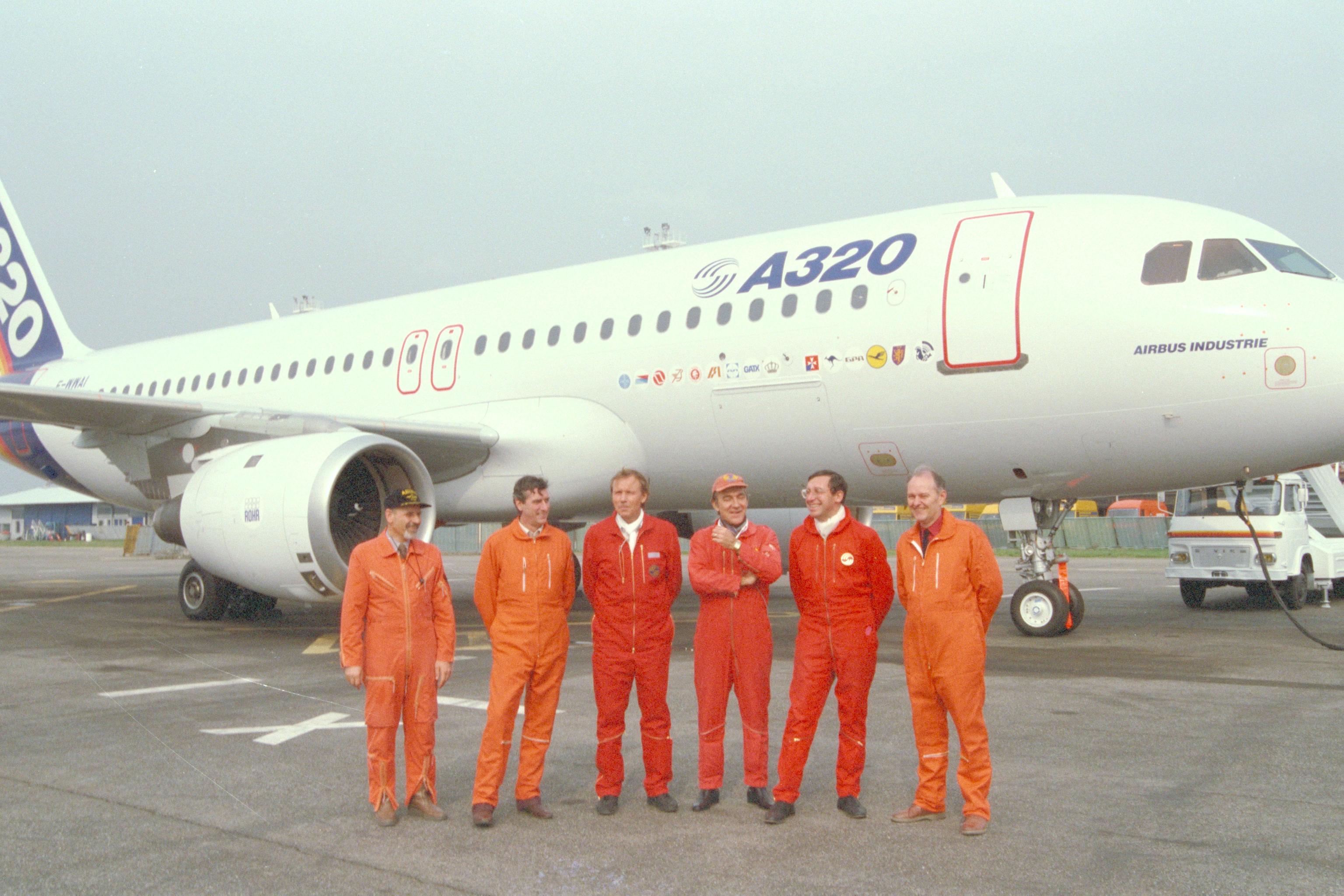 The original A320 test crew beside the prototype. The image comes from the manufacturer's first-flight retrospective.