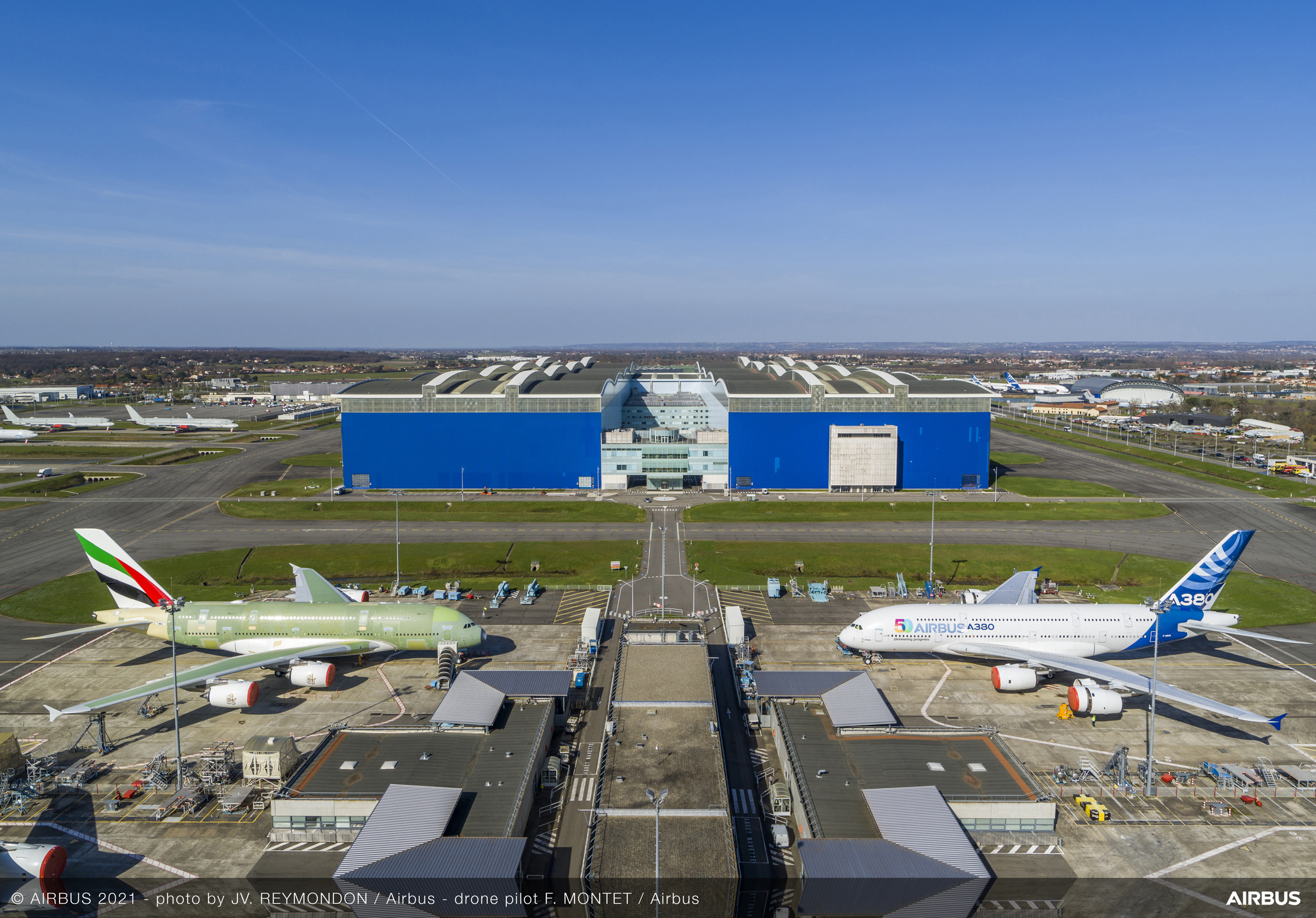A380 prototype MSN001 faces the final production airframe, MSN272, at Toulouse in 2021. MSN272 is still partly in primer in this photograph.