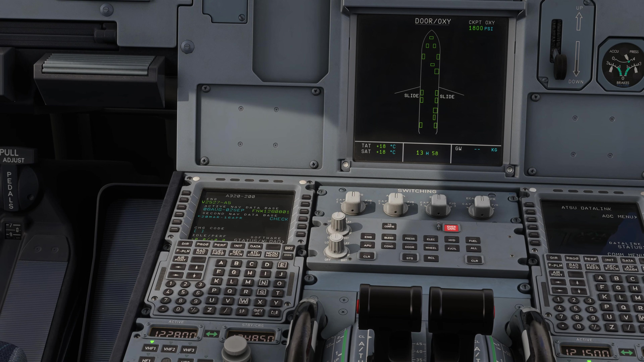 The DOOR/OXY page and central pedestal are visible together; the left MCDU identifies an A320-200 with V2527-A5 engines.